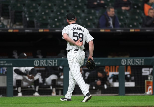 Chicago White Sox relief pitcher John Brebbia (59) walks to the dugout after being pulled from the game in the 8th inning against the Cleveland Guardians at Guaranteed Rate Field in Chicago on May 9, 2024. (Chris Sweda/Chicago Tribune)