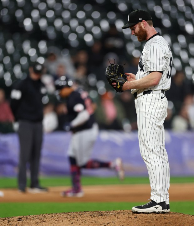 Chicago White Sox relief pitcher John Brebbia (59) stands on the mound after giving up a solo home run to Cleveland Guardians first baseman Josh Naylor (background) in the 8th inning of a game at Guaranteed Rate Field in Chicago on May 9, 2024. (Chris Sweda/Chicago Tribune)