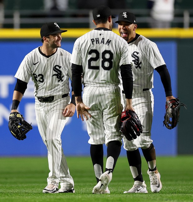 Chicago White Sox outfielders L to R: Andrew Benintendi, Tommy Pham, and Rafael Ortega, celebrate after a victory over the Cleveland Guardians at Guaranteed Rate Field in Chicago on May 9, 2024. (Chris Sweda/Chicago Tribune)