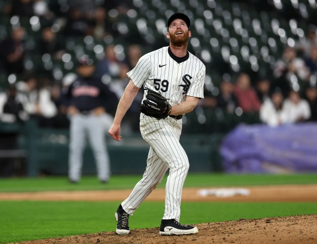 Chicago White Sox relief pitcher John Brebbia (59) watches the flight of the ball as Cleveland Guardians first baseman Josh Naylor hits a solo home run in the 8th inning of a game at Guaranteed Rate Field in Chicago on May 9, 2024. (Chris Sweda/Chicago Tribune)