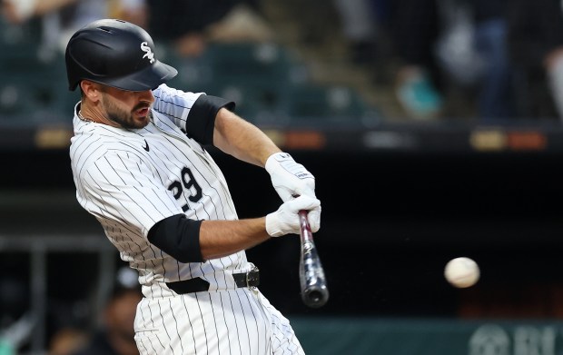 Chicago White Sox shortstop Paul DeJong (29) drives in a run on a single in the second inning of a game against the Cleveland Guardians at Guaranteed Rate Field in Chicago on May 9, 2024. (Chris Sweda/Chicago Tribune)