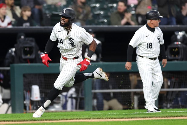 White Sox third baseman Bryan Ramos sprints around third base before scoring on a Paul DeJong single in the second inning against the Guardians on May 9, 2024, at Guaranteed Rate Field. (Chris Sweda/Chicago Tribune)