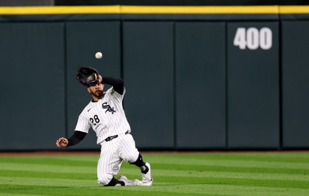 White Sox center fielder Tommy Pham makes a sliding catch of a fly ball hit by Guardians shortstop Brayan Rocchio in the sixth inning on May 9, 2024, at Guaranteed Rate Field. (Chris Sweda/Chicago Tribune)
