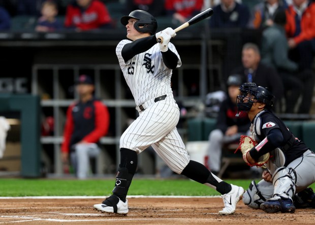 Chicago White Sox first baseman Andrew Vaughn (25) drives in a run on a double in the first inning of a game against the Cleveland Guardians at Guaranteed Rate Field in Chicago on May 9, 2024. (Chris Sweda/Chicago Tribune)