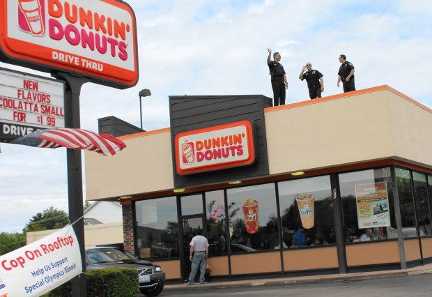 DuPage County sheriff's officers were stationed atop the Dunkin' Donuts on East Ogden Avenue in Naperville during the 2013 Cop on a Rooftop fundraiser for the Special Olympics. This year the event will be held May 20 at Dunkin' stores in Naperville, Fox Valley and all over the suburban Chicago area.