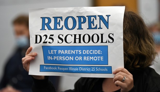 Parents and other stakeholders took part in a demonstration Sept. 17, 2020 at Arlington Heights School District 25 headquarters in Arlington Heights calling for the district to offer in-person instruction at school buildings. The issue came up during a March 13, 2021 forum featuring candidates running for seats on the board in the April 6 election.