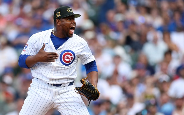 Cubs reliever Héctor Neris celebrates after closing out the Pirates in the ninth inning on May 18, 2024, at Wrigley Field. (Chris Sweda/Chicago Tribune)