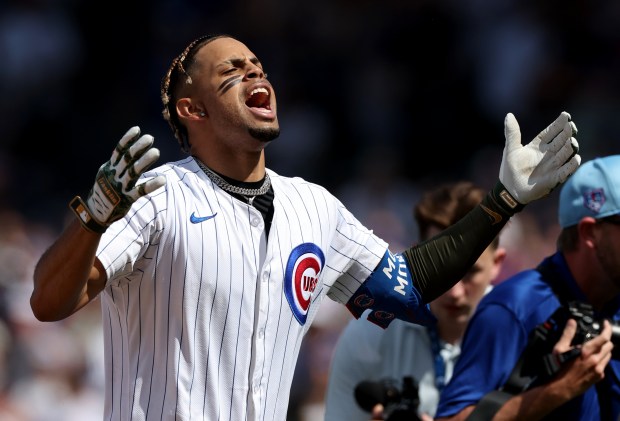 The Cubs' Christopher Morel celebrates after hitting a walk-off single in the ninth inning against the Pirates on May 18, 2024, at Wrigley Field. (Chris Sweda/Chicago Tribune)