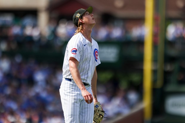 Chicago Cubs pitcher Ben Brown watches a pop-up during the eighth inning against the Pittsburgh Pirates at Wrigley Field on May 19, 2024. (Eileen T. Meslar/Chicago Tribune)