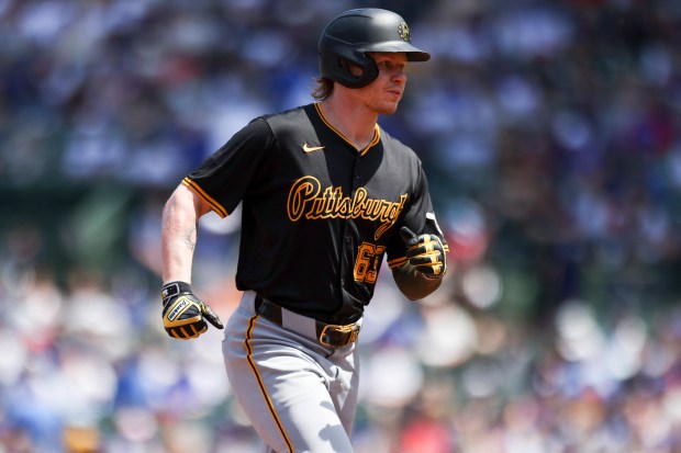 Pittsburgh Pirates outfielder Jack Suwinski (65) runs to third base after hitting a home run during the second inning against the Pittsburgh Pirates at Wrigley Field on May 19, 2024. (Eileen T. Meslar/Chicago Tribune)