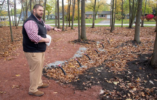 Porter County Public Library System director Jesse Butz discusses plans for the installation of a library garden in the woods alongside the South Haven branch as well as plans for branches countywide on Friday, October 27, 2023. (Michael Gard/Post-Tribune)