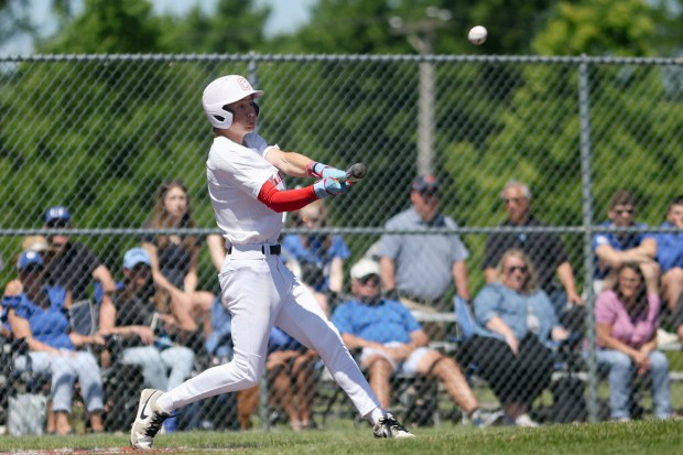 Lincoln-Way Central's Jimmy Hawksworth (5) hits a two RBI triple during the first inning of the Class 4A Lincoln-Way Central Regional final against Lincoln-Way East in New Lenox on Saturday, May 25, 2024. (Troy Stolt/for the Daily Southtown)