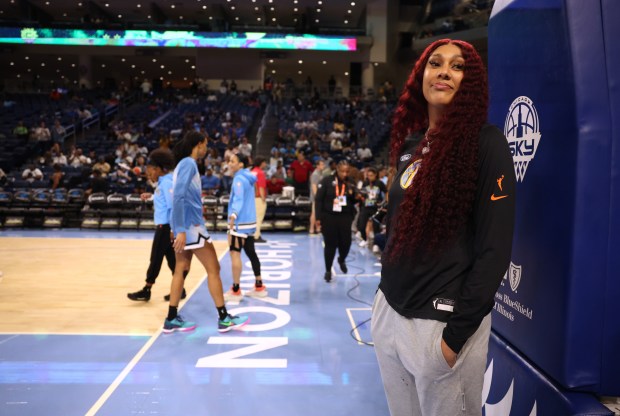 Injured center Kamilla Cardoso looks on as the Sky warm up for their home opener against the Connecticut Sun at Wintrust Arena in Chicago on May 25, 2024. (Chris Sweda/Chicago Tribune)