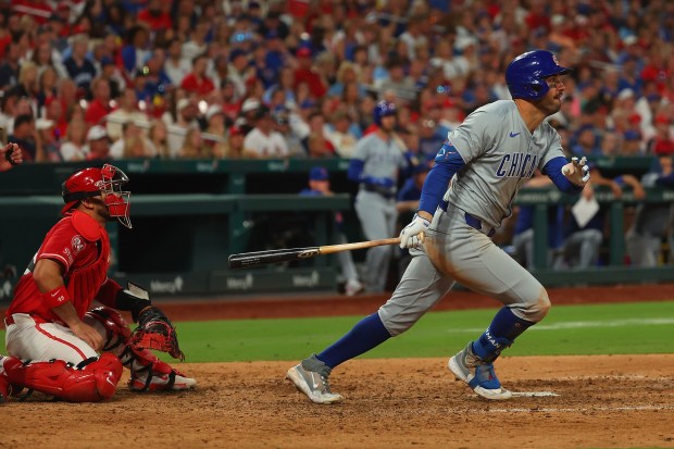 Cubs outfielder Mike Tauchman hits an RBI single against the Cardinals in the ninth inning on May 25, 2024, at Busch Stadium in St Louis, Mo. (Dilip Vishwanat/Getty)