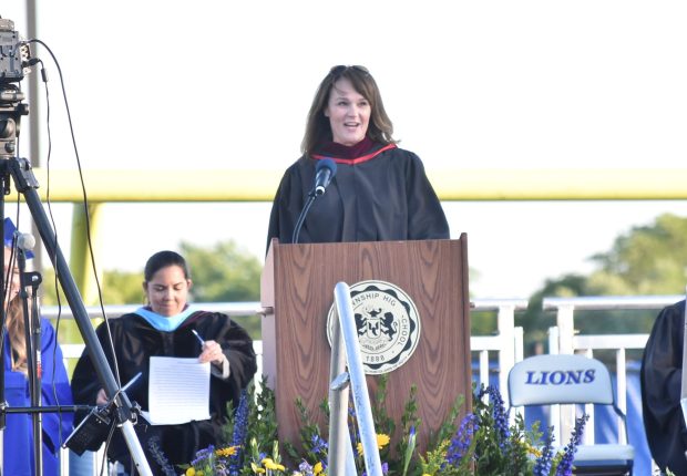Jill Grech, the president of the LTHS board of education, sends the 2024 graduates off on Wednesday, May 29. (Jesse Wright)