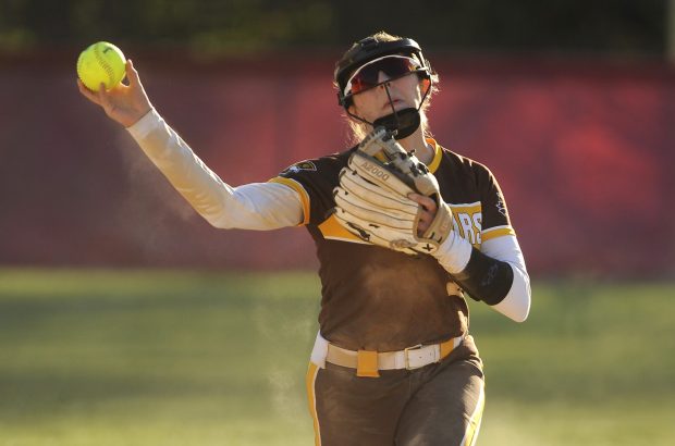 Carmel's short stop Aly Krogman (9) makes the throw to first base against Benet during an East Suburban Catholic Conference game Wednesday, April 24, 2024 in Lisle, IL. (Steve Johnston/Naperville Sun)