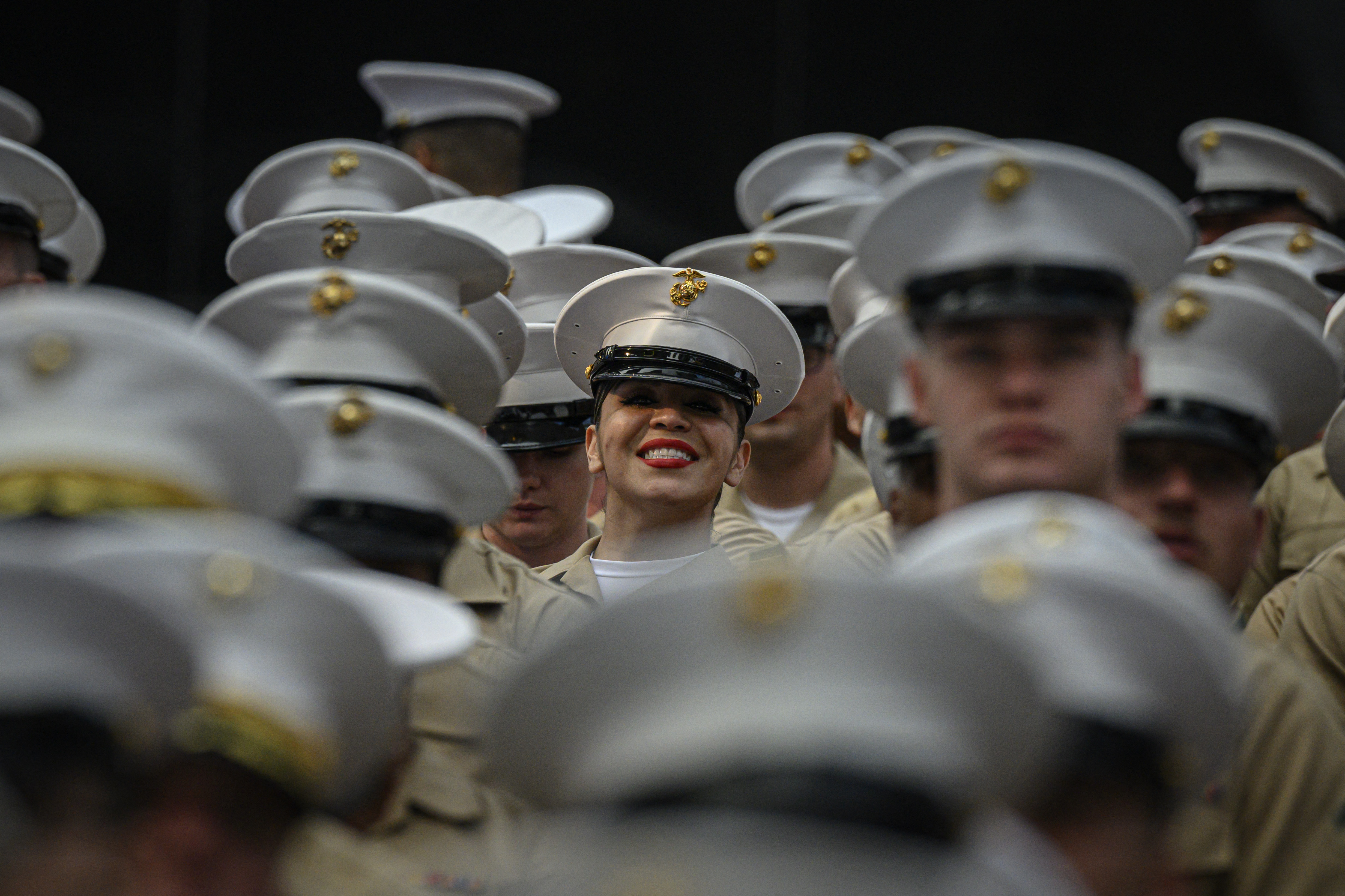 U.S. servicemembers gather for a group photo in Times Square, as part of Fleet Week celebrations in New York on May 24, 2023.