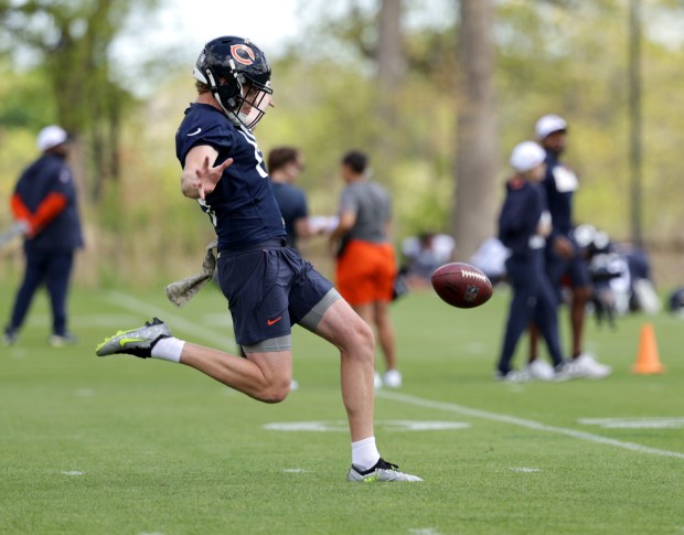 Tory Taylor practices punting during Bears rookie minicamp on May 10, 2024, at Halas Hall in Lake Forest. (Stacey Wescott/Chicago Tribune)