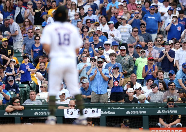 Cubs fans applaud before starting pitcher Shota Imanaga struck out the final batter in the top of the seventh inning against the Pirates on May 18, 2024, at Wrigley Field. (Chris Sweda/Chicago Tribune)