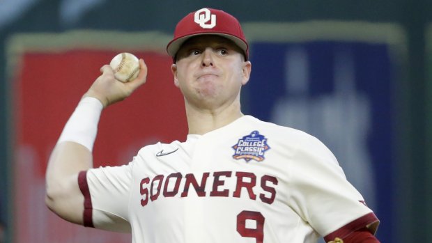 Oklahoma pitcher Cade Horton (9) during an NCAA baseball game against Tennessee on Sunday, March 6, 2022, in Houston. (AP Photo/Michael Wyke).