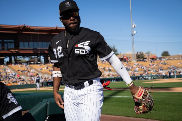 White Sox third baseman Bryan Ramos between innings of a spring training game against the Mariners on Feb. 27, 2023, at Camelback Ranch in Glendale, Ariz. (E. Jason Wambsgans/Chicago Tribune)