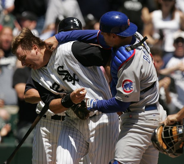 Cubs' Michael Barrett punches the White Sox's A.J. Pierzynski during a game on May 20, 2016 at U.S. Cellular Field. (Phil Velasquez/Chicago Tribune)