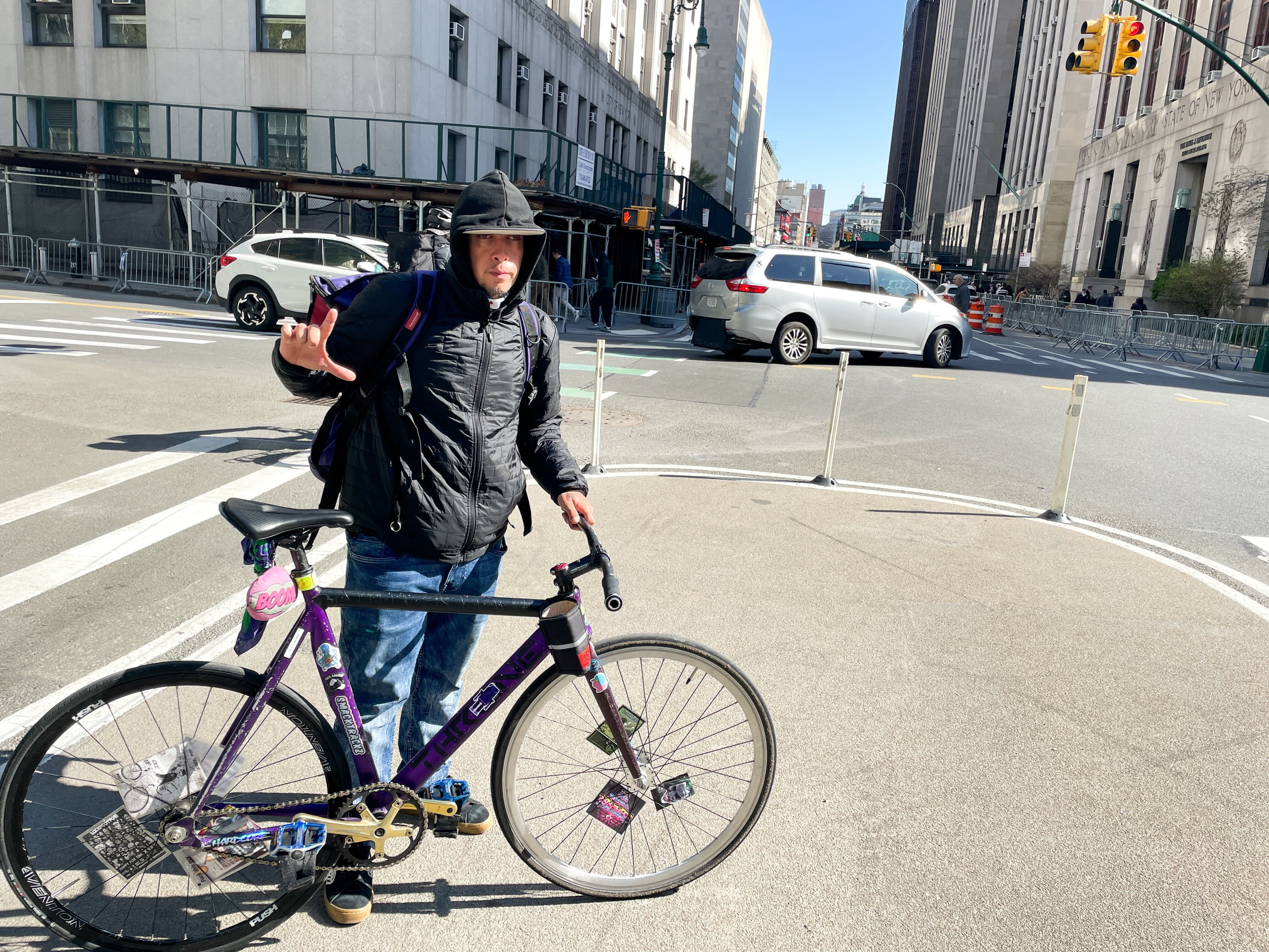 Bike messenger Timothy Ramirez said the NYPD's move to block the Centre Street bike lane during the trial of former President Donald Trump makes his job more dangerous.