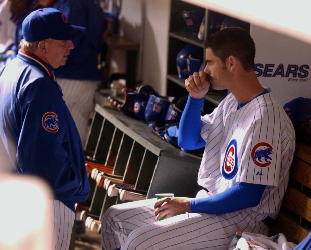 Cubs pitcher Mark Prior talks with coach Larry Rothschild after being pulled against the Pirates on May 22, 2002, at Wrigley Field. (Phil Velasquez/Chicago Tribune)