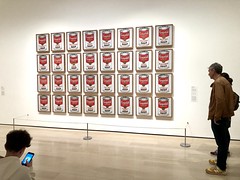 In New York’s Museum of Modern Art. Andy Warhol soup cans. I love how the person in front is just reading his phone. Andy probably would have loved that.