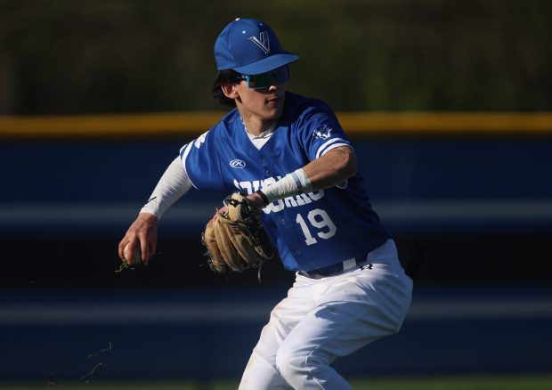 Vernon Hills left fielder Tyler Perritt (19) throws to second base during a game against Highland Park at Wolters Field in Highland Park on Tuesday, April 30, 2024. (Trent Sprague/for the News-Sun)