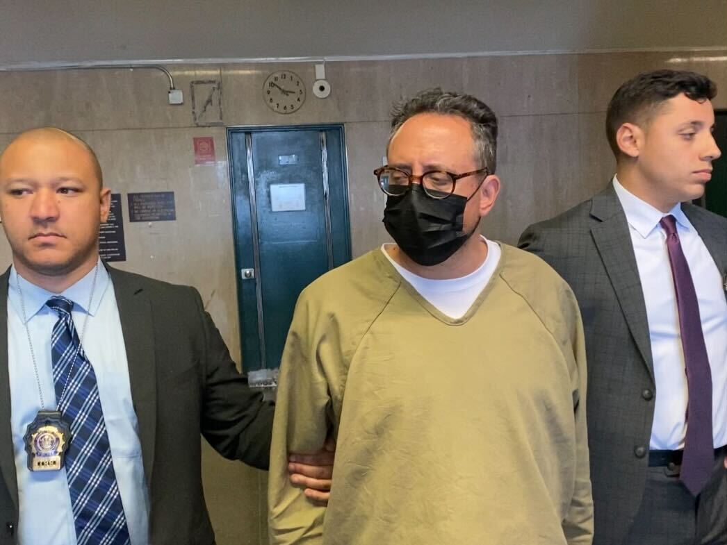 Manhattan landlord Daniel Ohebshalom (center) pleaded not guilty on Wednesday to charges that he harassed tenants in his buildings.