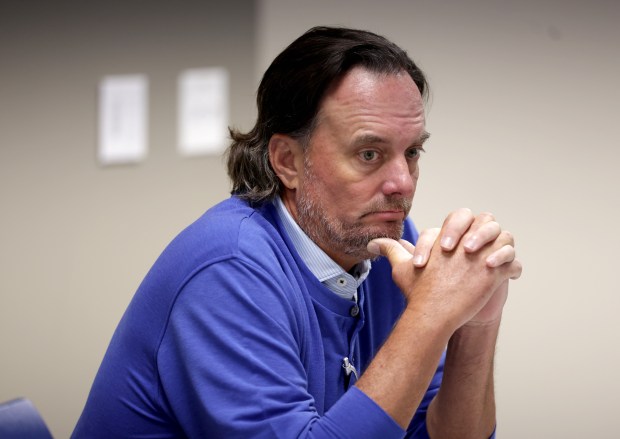 Dan Proft listens during a hearing held by the State Board of Elections after Illinois Democrats filed a complaint against the GOP strategist and right wing radio talk show host for alleged illegal election coordination with former GOP gubernatorial nominee Darren Bailey on April 29, 2024, in Chicago. (Stacey Wescott/Chicago Tribune)