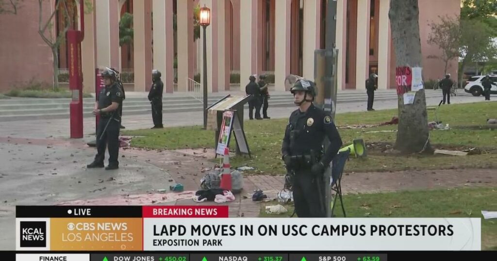 Lapd Riot Officers LAPD officers in riot gear clear pro-Palestine encampment on USC campus ...