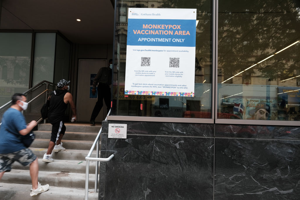 People walk into a New York City health clinic administering mpox vaccines on Aug. 5, 2022.