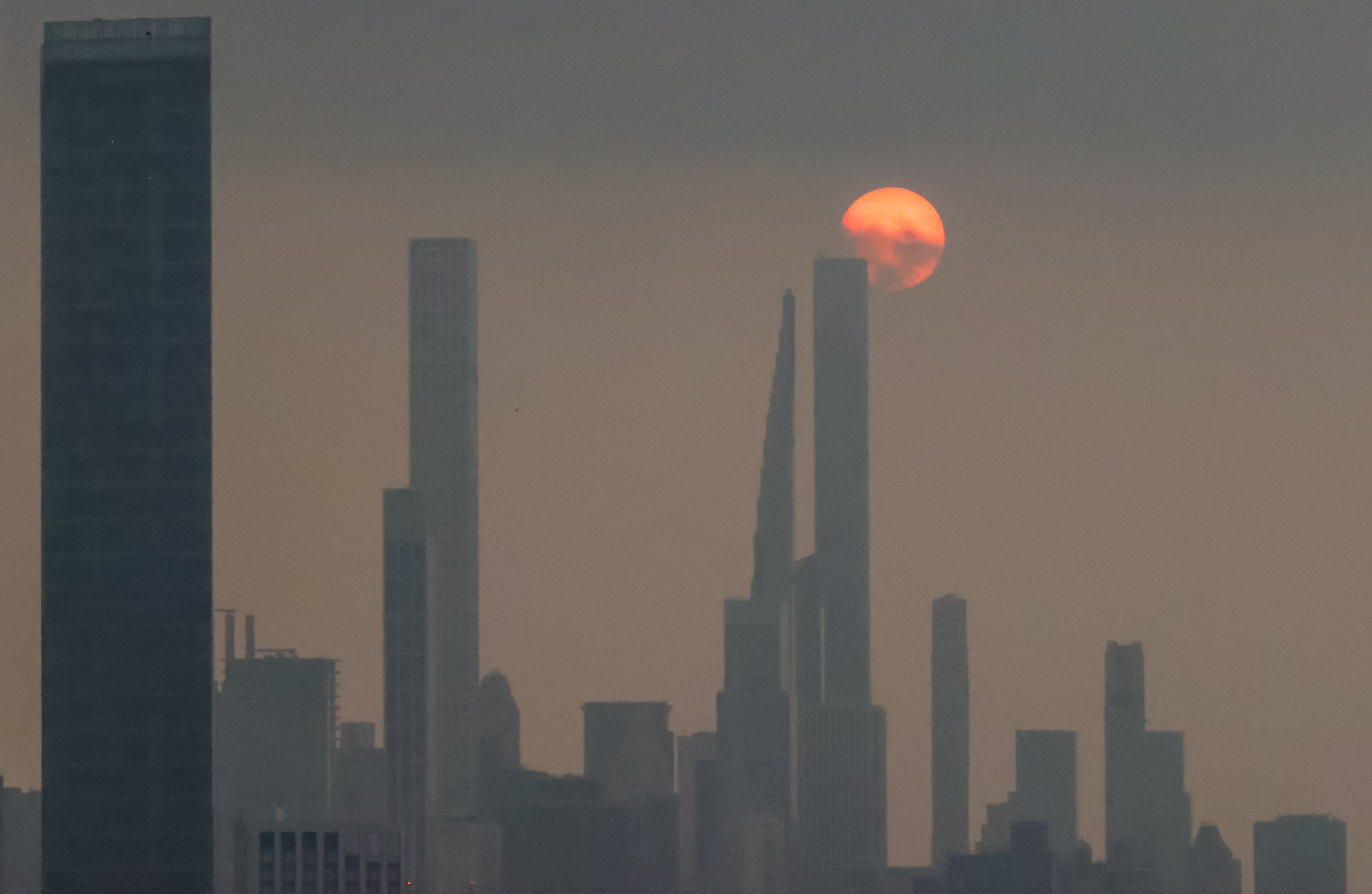 A photo of a smoky haze over NYC during last year's wildfire season.