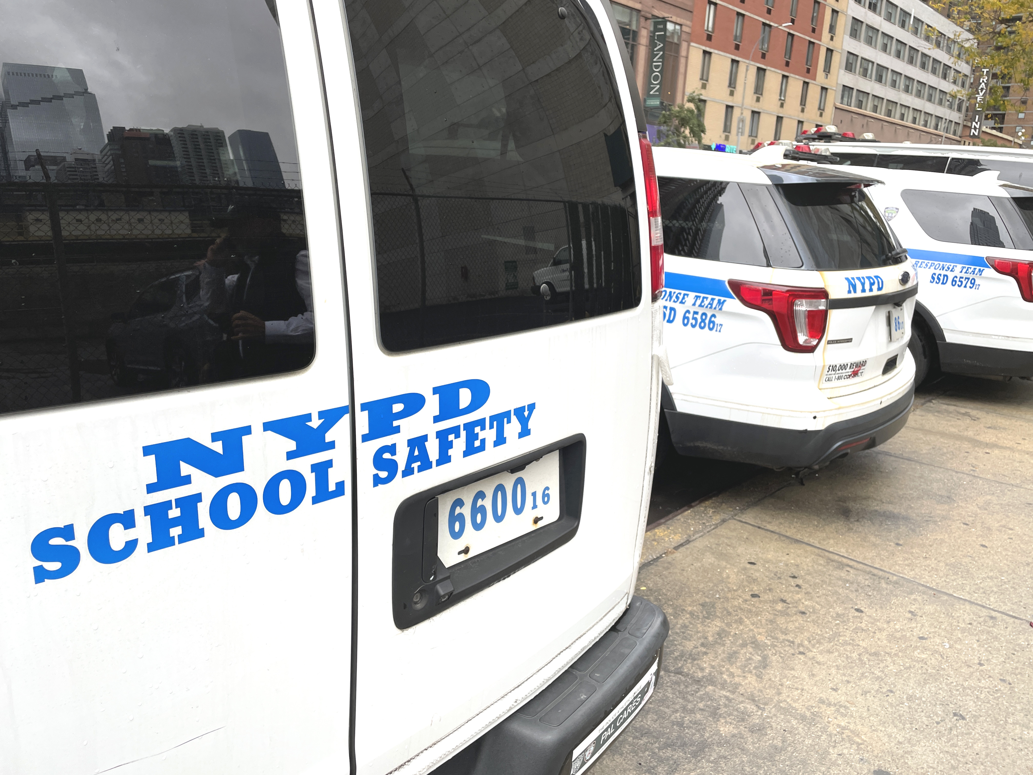 Parking NYPD school safety vans.