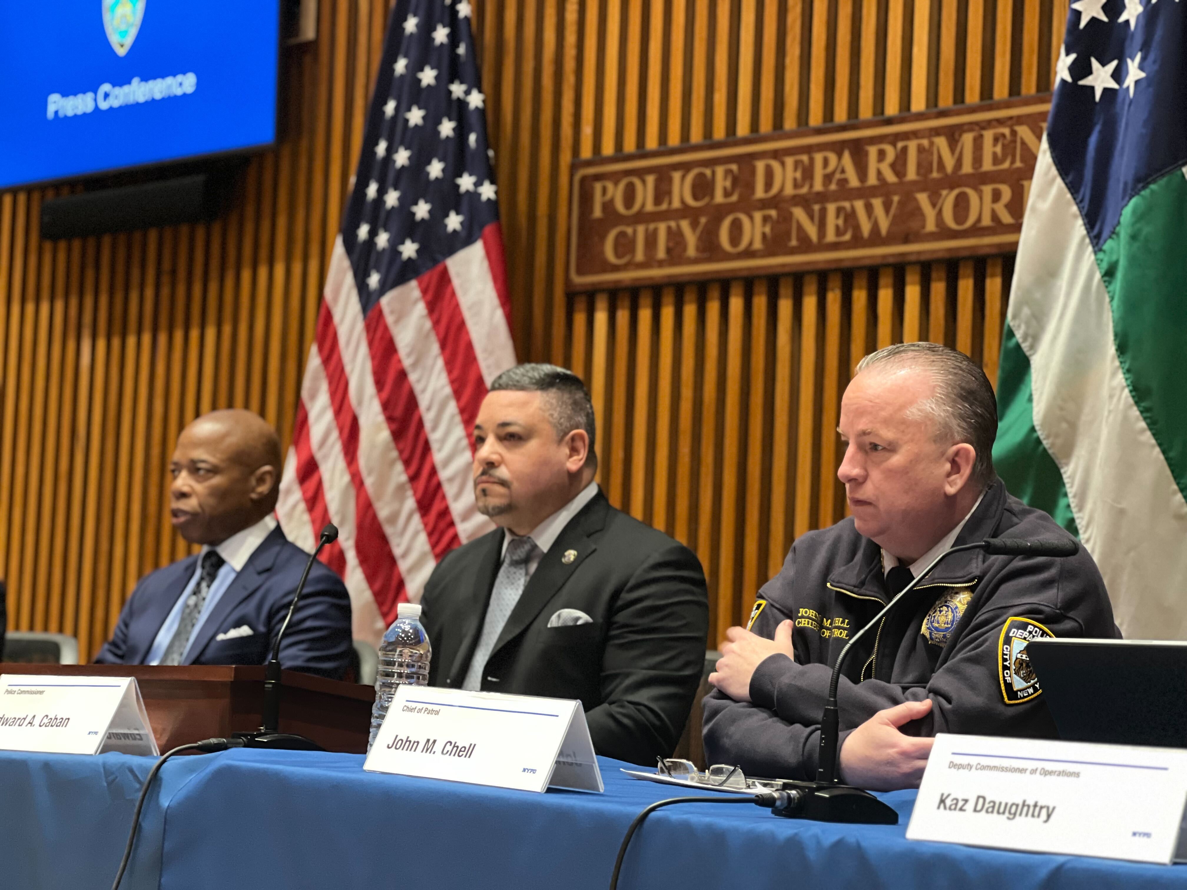 From left, Mayor Adams, NYPD Commissioner Edward Caban and NYPD Chief of Patrol John Chell at Wednesday's press conference.