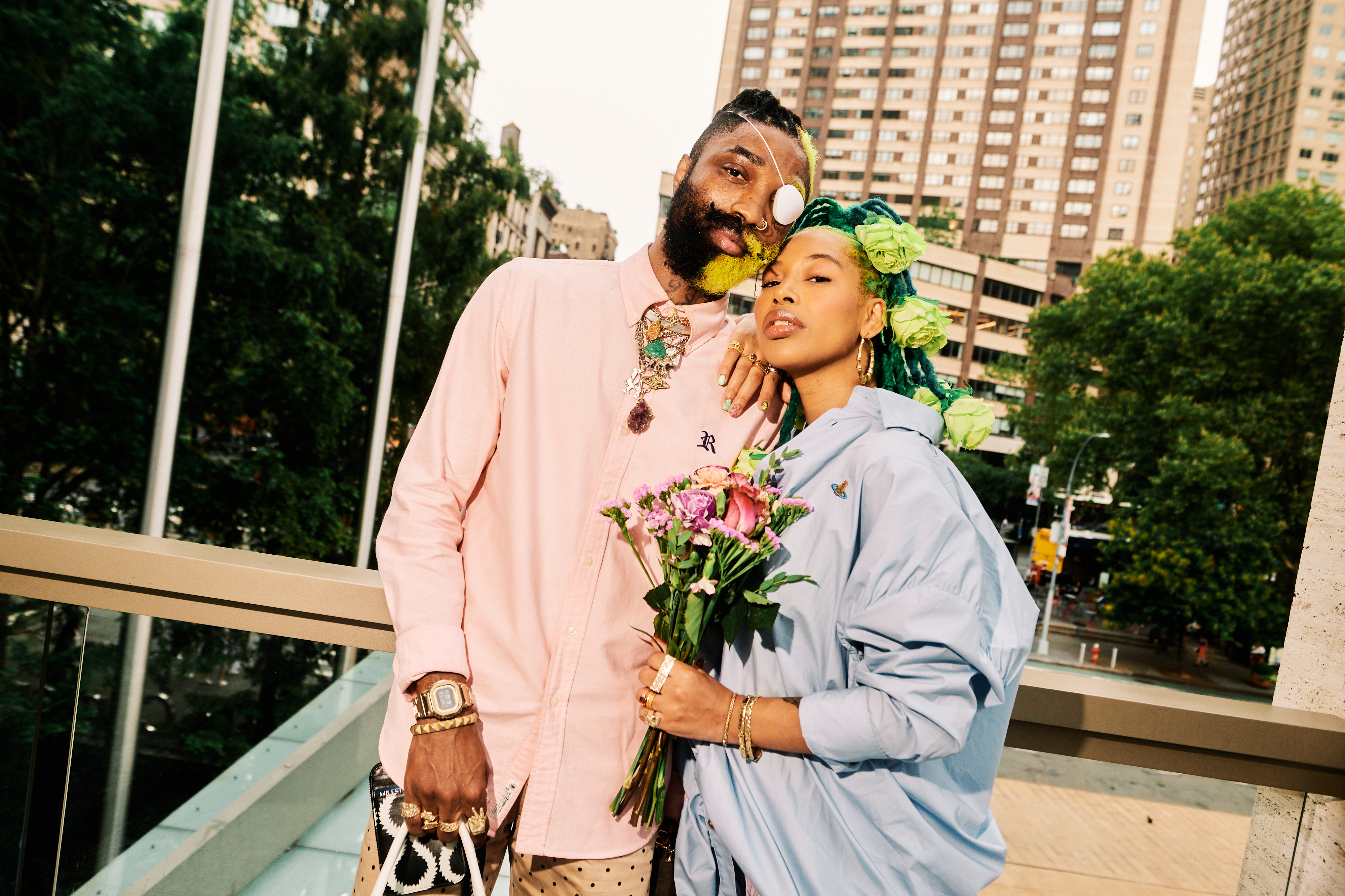 People celebrating a wedding at Lincoln Center’s David Geffen Hall.