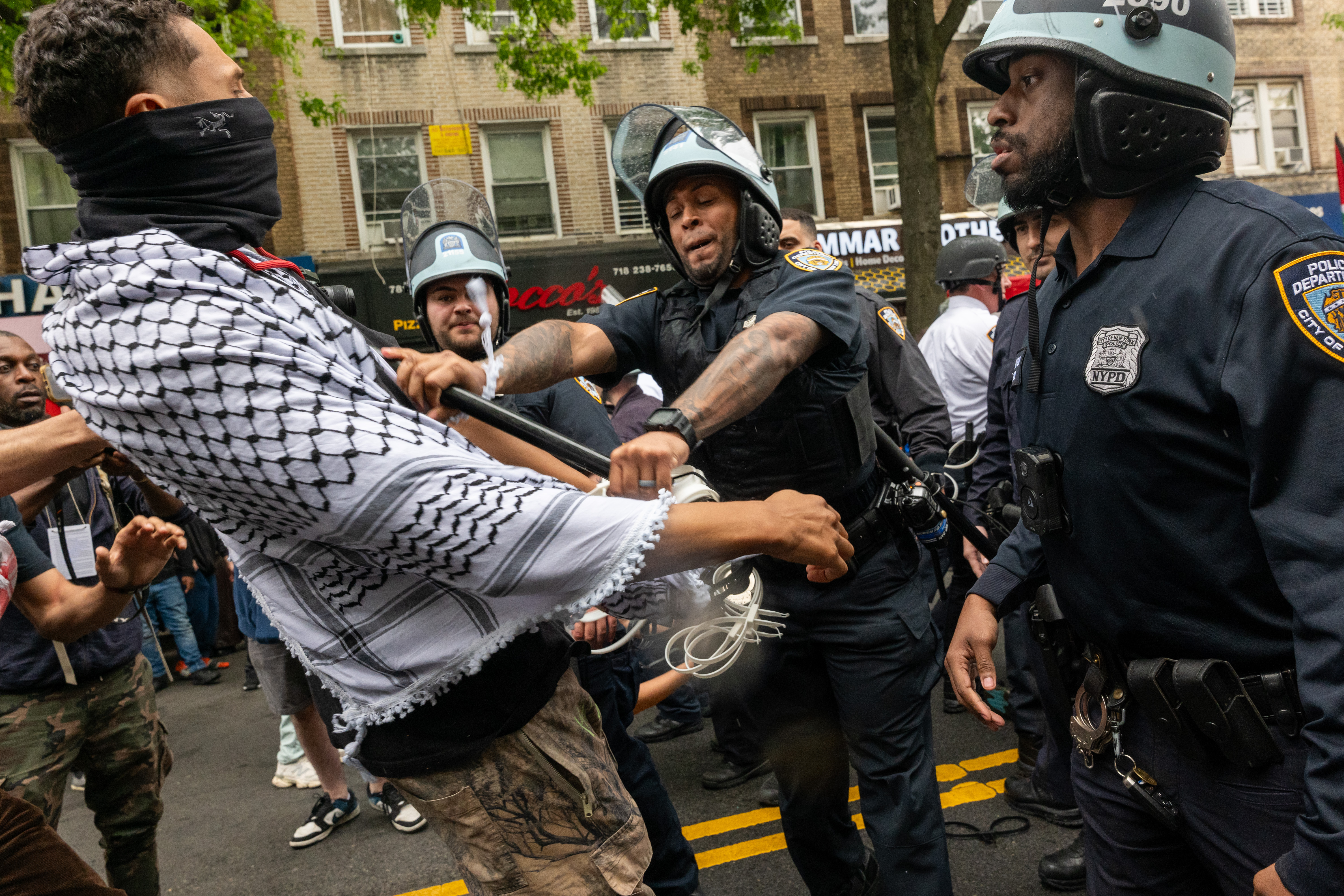 Pro-Palestinian protesters confront police during a Nakba Day rally and march on May 18, 2024 in Bay Ridge.