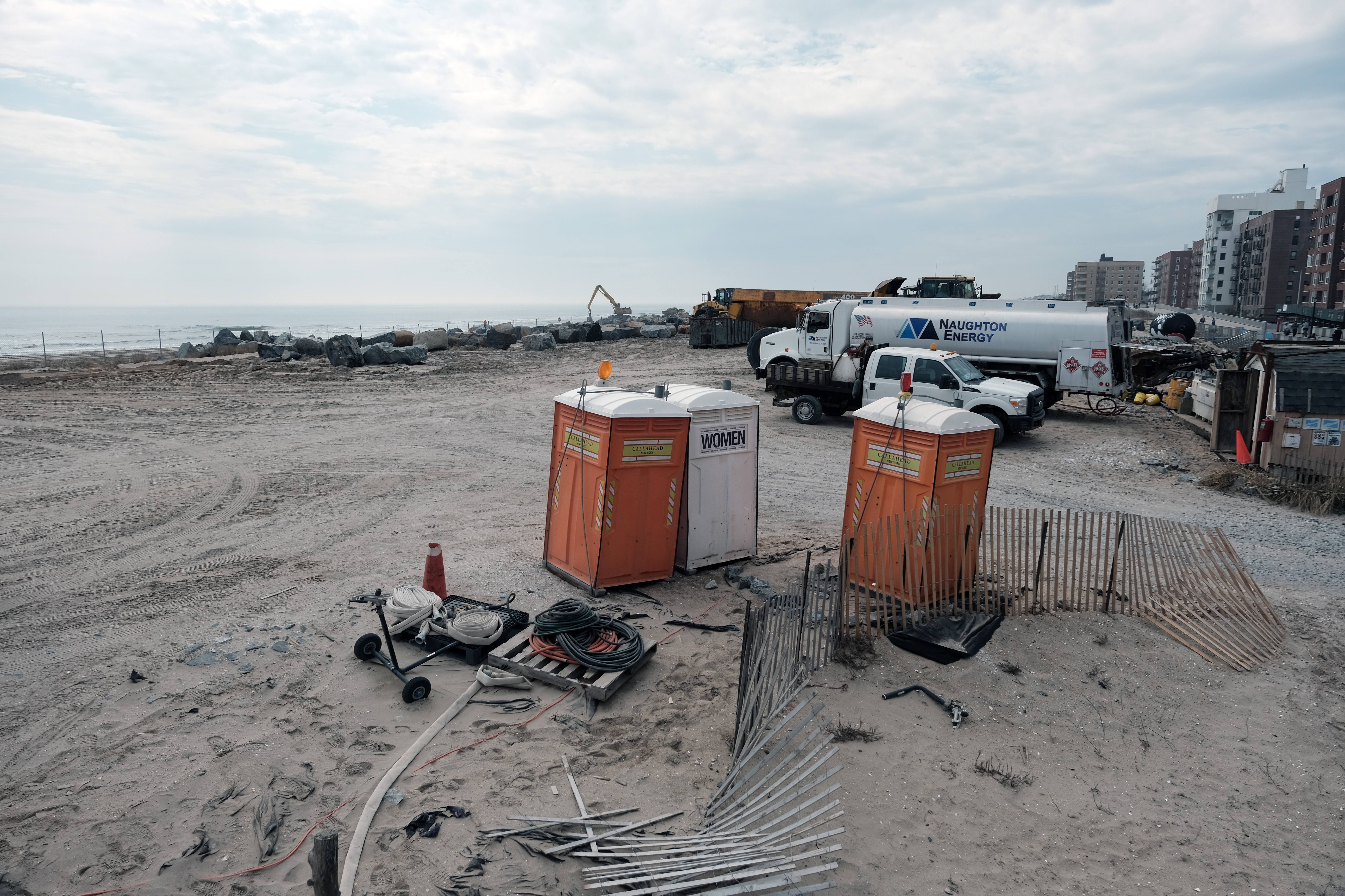 Construction equipment sits along a boardwalk at Rockaway Beach on April 6, 2023.