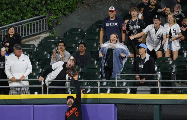 Orioles outfielder Colton Cowser (17) leaps to rob a home run ball hit by White Sox centerfielder Tommy Pham for the final out of the game in a 6-4 loss for the White Sox at Guaranteed Rate Field on May 24, 2024, in Chicago. (John J. Kim/Chicago Tribune)