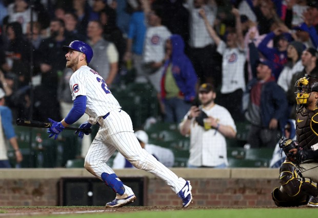 Chicago Cubs first baseman Michael Busch (29) watches the flight of walk-off solo home run in the ninth inning of a game against the San Diego Padres at Wrigley Field in Chicago on May 7, 2024. (Chris Sweda/Chicago Tribune)