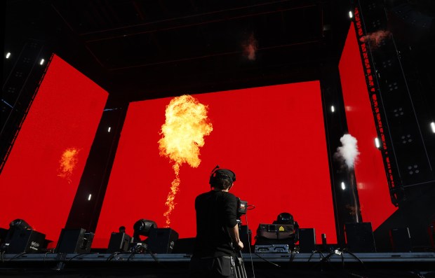 A flame ball rises on the stage as Bizarrap performs during the Sueños Music Festival at Grant Park on May 25, 2024, in Chicago. (John J. Kim/Chicago Tribune)