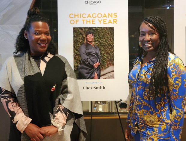 Chez Smith, left, of Chicago Heights, and Venisha Bonds, of Dolton, stand at a 2022 event where Smith received a Chicagoan of the Year honor. The two work together with at a nonprofit group formed to help women and girls with programs that combat "negative health outcomes." (Chez Smith)