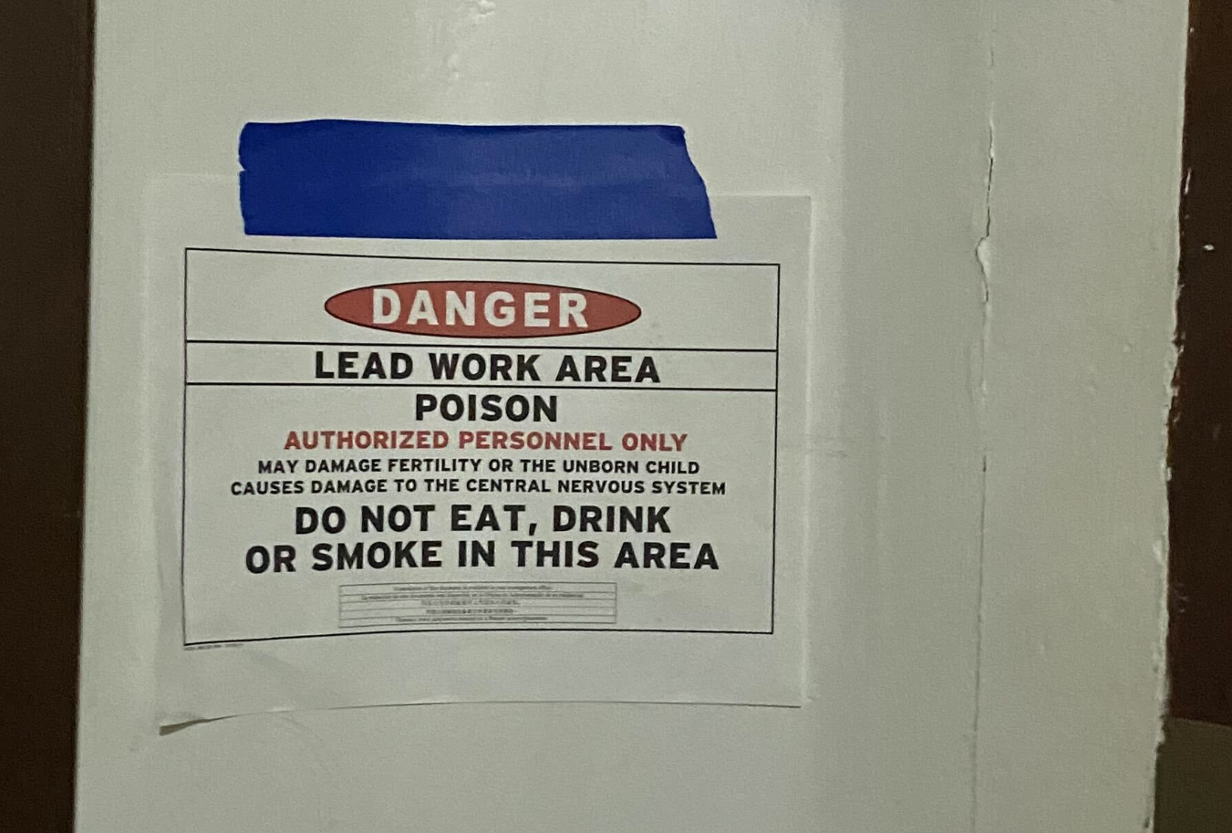 A sign indicating lead paint abatement work