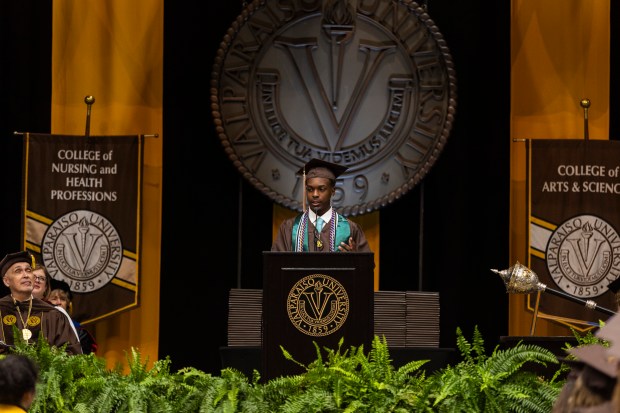 Valparaiso University class of 2024 student Jaylen Jai'shawn Jude, speaks about his life journey from the city of Gary to a graduate at the university, as part of the senior class class remarks during their commencement ceremony on Saturday, May 11, 2024, in Valparaiso. (Vincent D. Johnson/for the Post-Tribune)