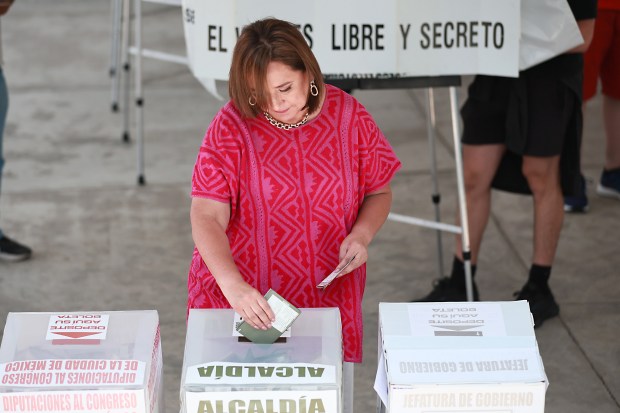 Presidential candidate Xóchitl Gálvez of the 'Fuerza y Corazón por México' coalition casts her vote during the presidential elections at Escuela Primaria El Chamizal on June 2, 2024, in Mexico City, Mexico. According to the Instituto Nacional Electoral (INE) over 100 million people are allowed to vote on the 2024 Presidential Election in Mexico. Claudia Sheinbaum of the Sigamos Haciendo Historia coalition, Xochitl Galvez of Fuerza y Corazón por México coalition and Jorge Alvarez Maynez of Movimiento Ciudadano will participate as the candidates for the presidency. (Manuel Velasquez/Getty)