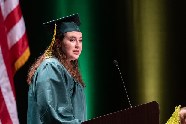 Glenbrook North graduate Molly Becker gives a speech during graduation at Rosemont Theatre on Sunday, June 2, 2024. (Troy Stolt/for the Pioneer Press)
