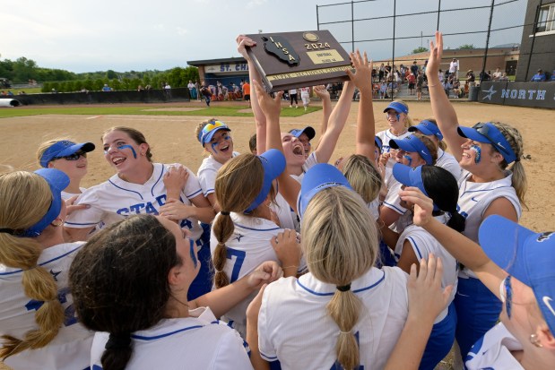 St. Charles North celebrate winning the Class 4A St. Charles North Supersectional over Whitney Young at home in St. Charles on Monday, June 3, 2024. (Mark Black / for the Beacon-News)