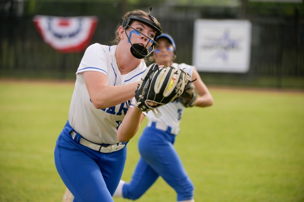 St. Charles North first baseman Abby Zawadzki (14) catches a pop up for an out against Whitney Young during the Class 4A St. Charles North Supersectional in St. Charles on Monday, June 3, 2024. (Mark Black / for the Beacon-News)
